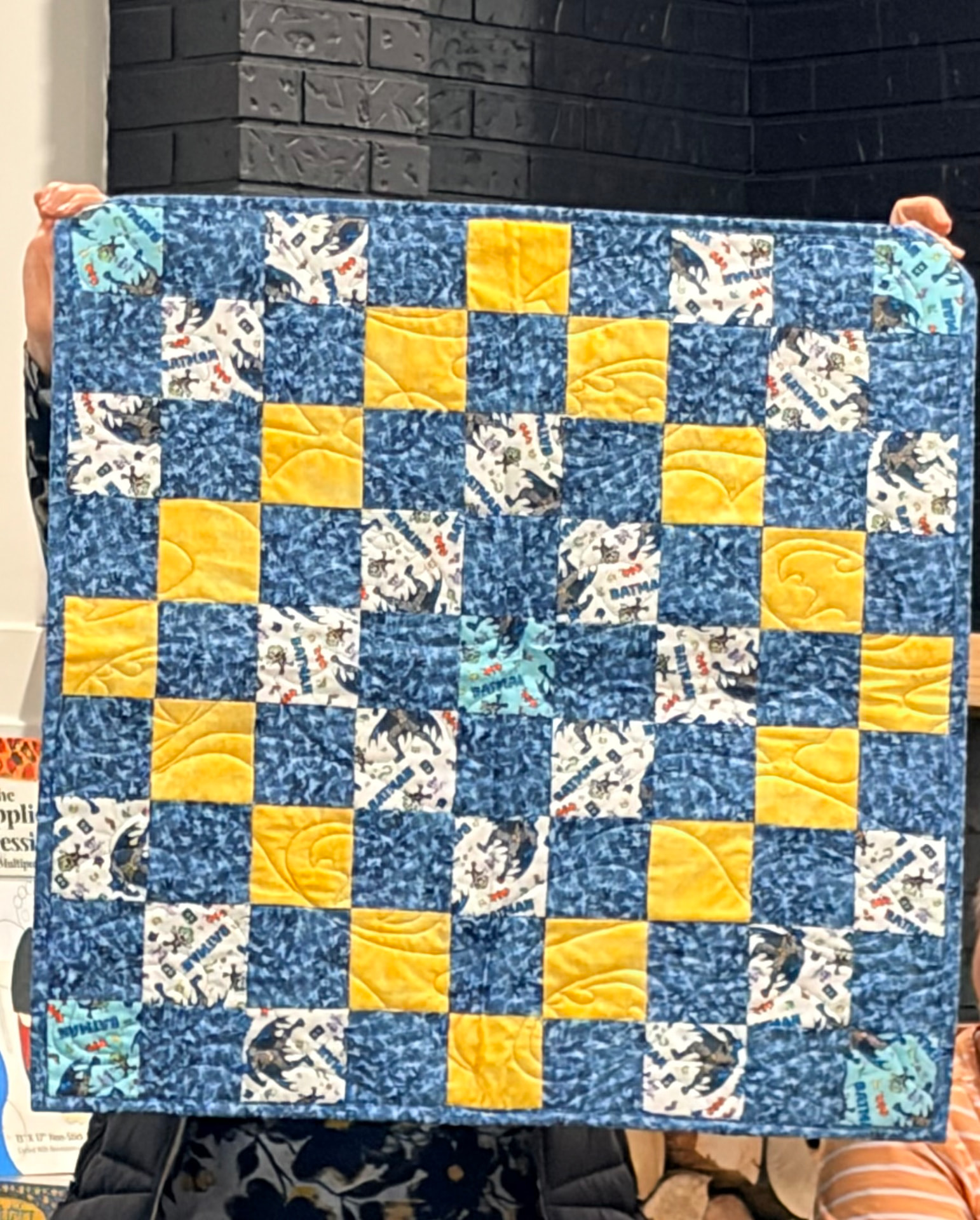 Batman checkerboard quilt in blue and yellow