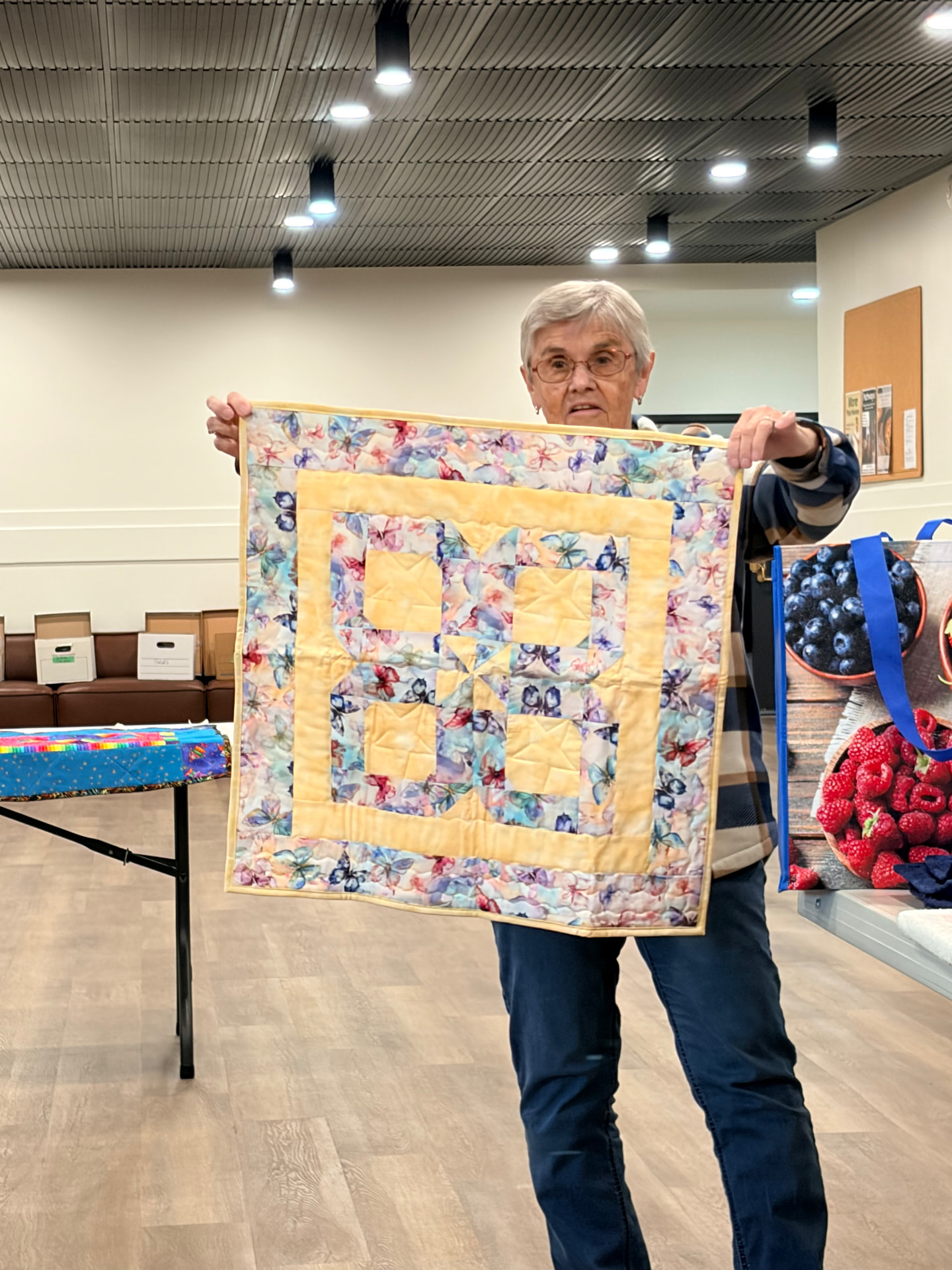 Butterfly nine-patch quilt with butterfly-print blocks